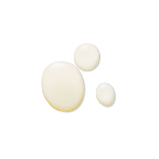 Three white spherical objects on a light beige background