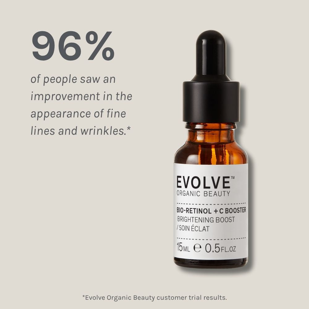 Evolve Organic Beauty serum bottle with dropper on a light gray background